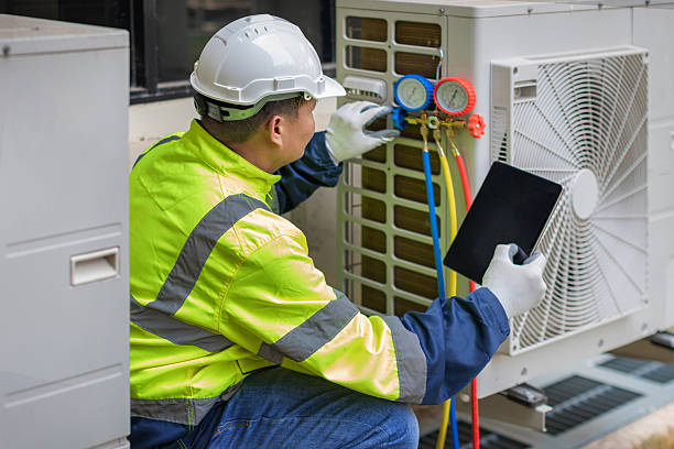Professional Heat Pump Repair technician working in Uniontown, AL